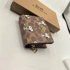 COACH x Peanuts Snap Wallet CBN32 Signature Canvas with Snoopy Print – NWT