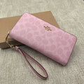 Coach CW778 Long Zip-Around Wallet in Signature Canvas – Pink – New with Box